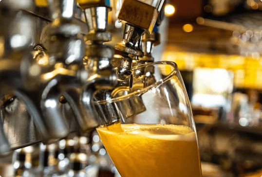 A glass refilling beer